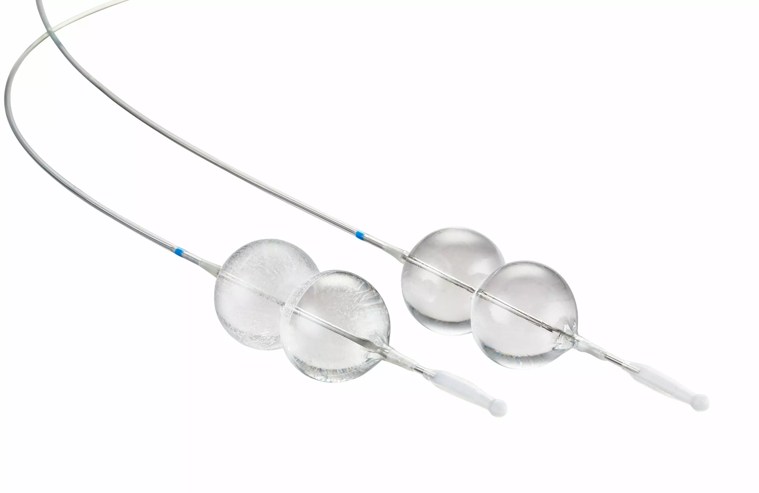 a pair of clear drug coated balloons with a wire attached to them on a white background