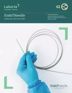 a person wearing blue gloves is holding a needle in their hand