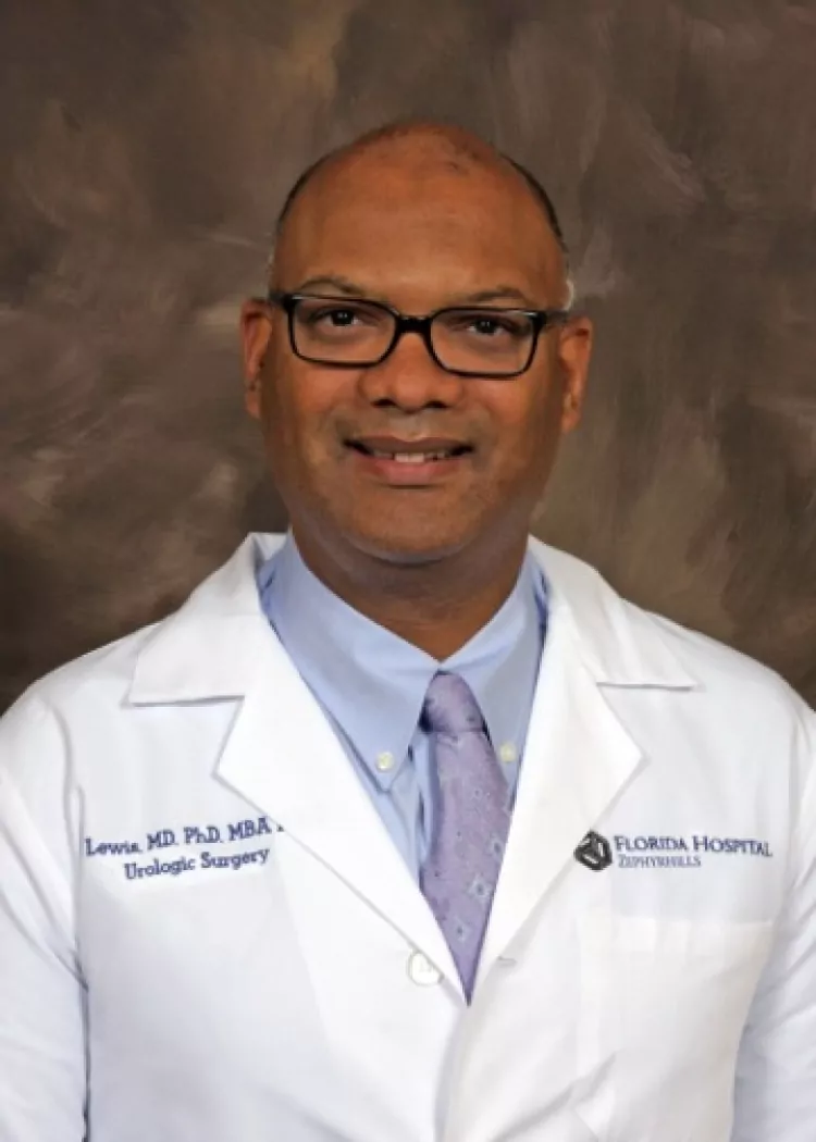 a man in a lab coat with the name lewis on it